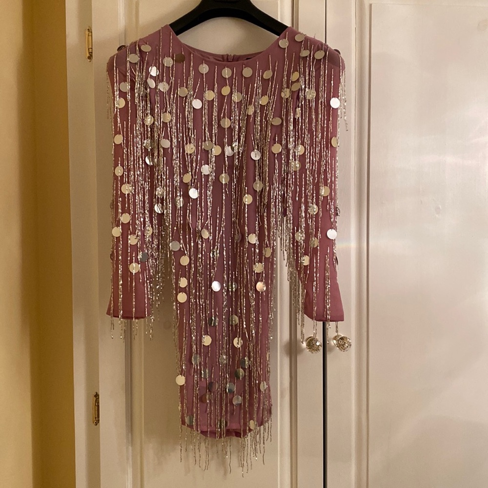 Gorgeous and spectacular pink sequin dress.